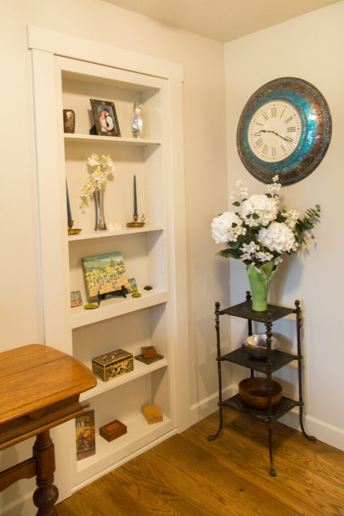 A secret bedroom door with a built-in shelving unit