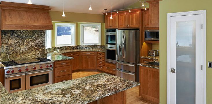 Marble countertops in a circular kitchen nook, as remodeled by W.L. Construction in Corvallis, Oregon.