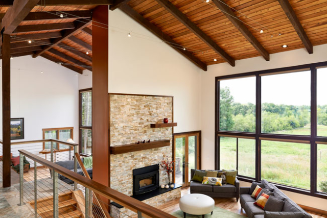 Whole-home remodel took out dated brick and added a new fireplace and brighter interior in this project by W.L. Construction in Corvallis, Oregon.