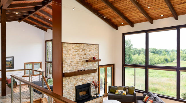 Whole-home remodel took out dated brick and added a new fireplace and brighter interior in this project by W.L. Construction in Corvallis, Oregon.